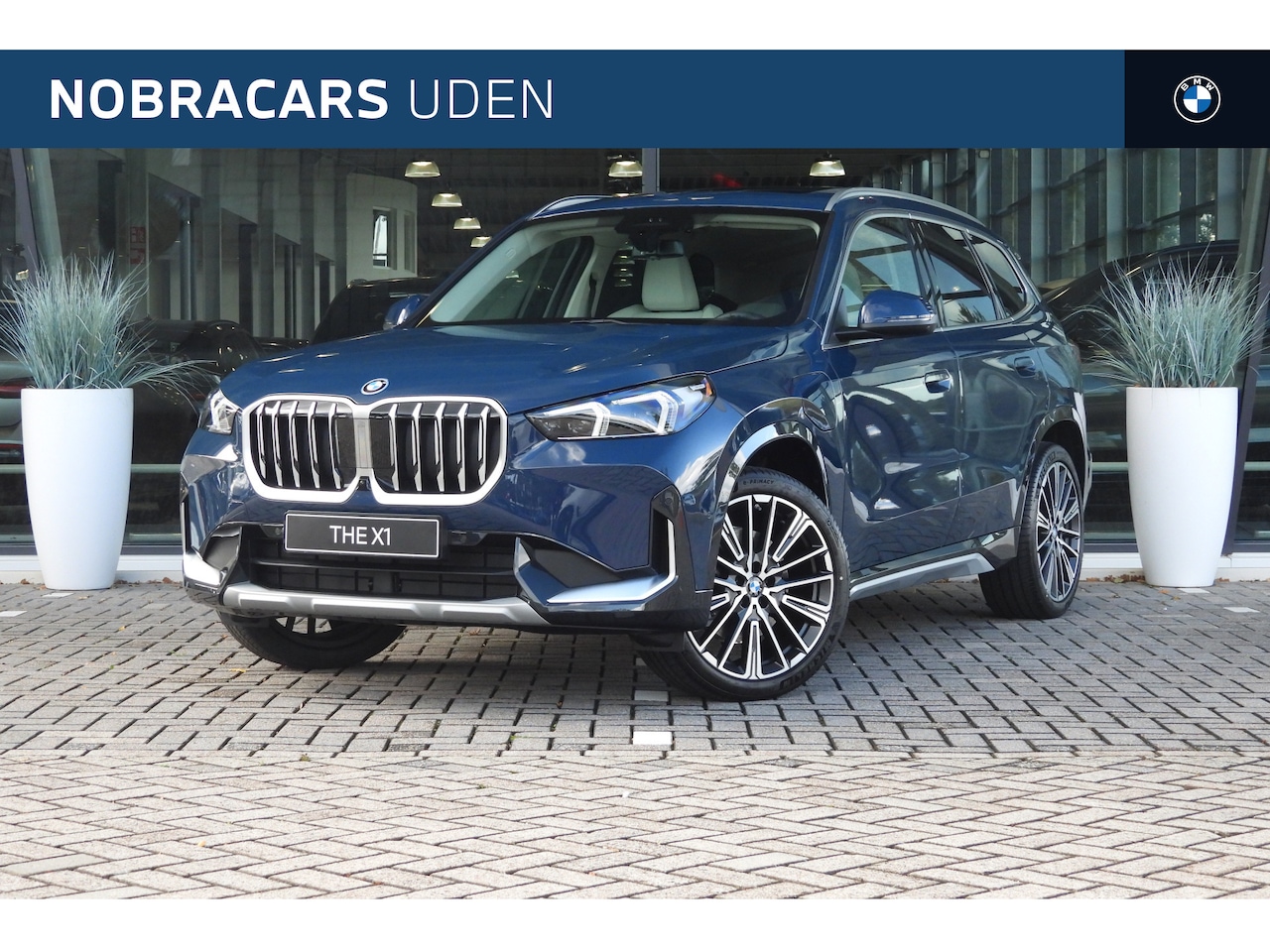 BMW X1 - xDrive30e High Executive xLine Automaat / Panoramadak / Trekhaak / Sportstoelen / Parking - AutoWereld.nl