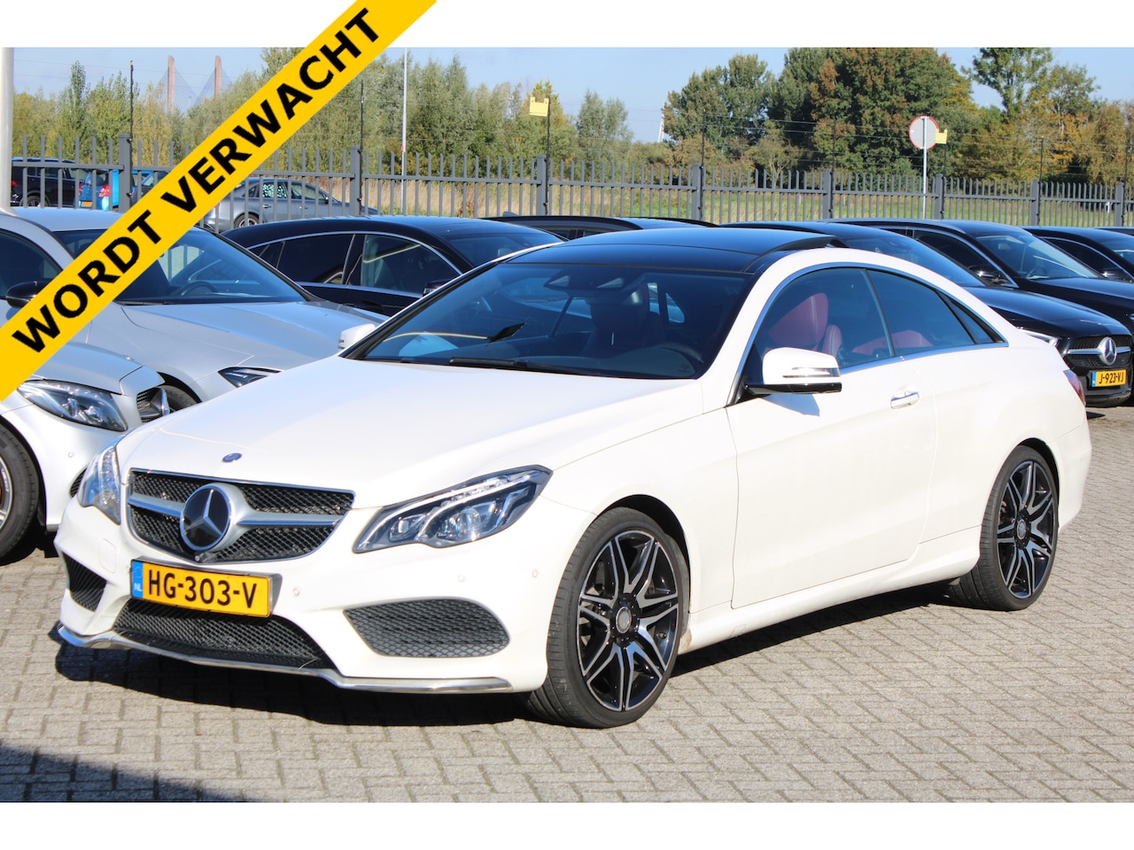 Mercedes-Benz E-klasse Coupé - 320 Prestige AMG PANORAMADAK LEDER MEMORY DISTRONIC 360-CAMERA H&K 19'' - AutoWereld.nl