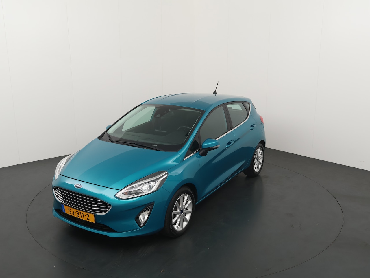 Ford Fiesta - EcoBoost 100pk Titanium | 100% dealer onderhouden | Winterpack | Adapt. Cruise | B&O | Cam - AutoWereld.nl