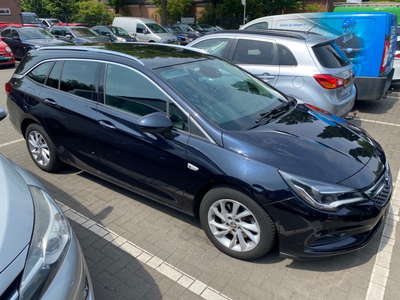 Opel Astra Sports Tourer - 1.6 CDTI Business Executive SPORTS TOURER 1.6 CDTI BUSINESS EXECUTIVE - AutoWereld.nl