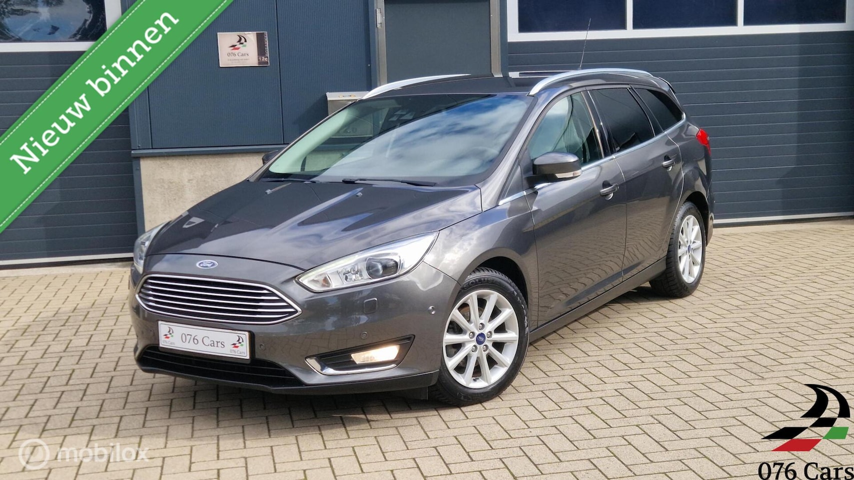 Ford Focus Wagon - 1.0 Titanium Edition VOL OPTIES KEYLESS NAVI PDC - AutoWereld.nl