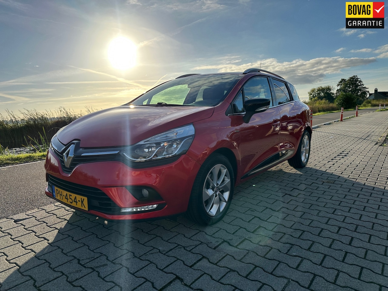 Renault Clio Estate - 0.9 TCe Limited 0.9 TCe Limited, Navi, PDC, Cruisecontrol, Bluetooth - AutoWereld.nl