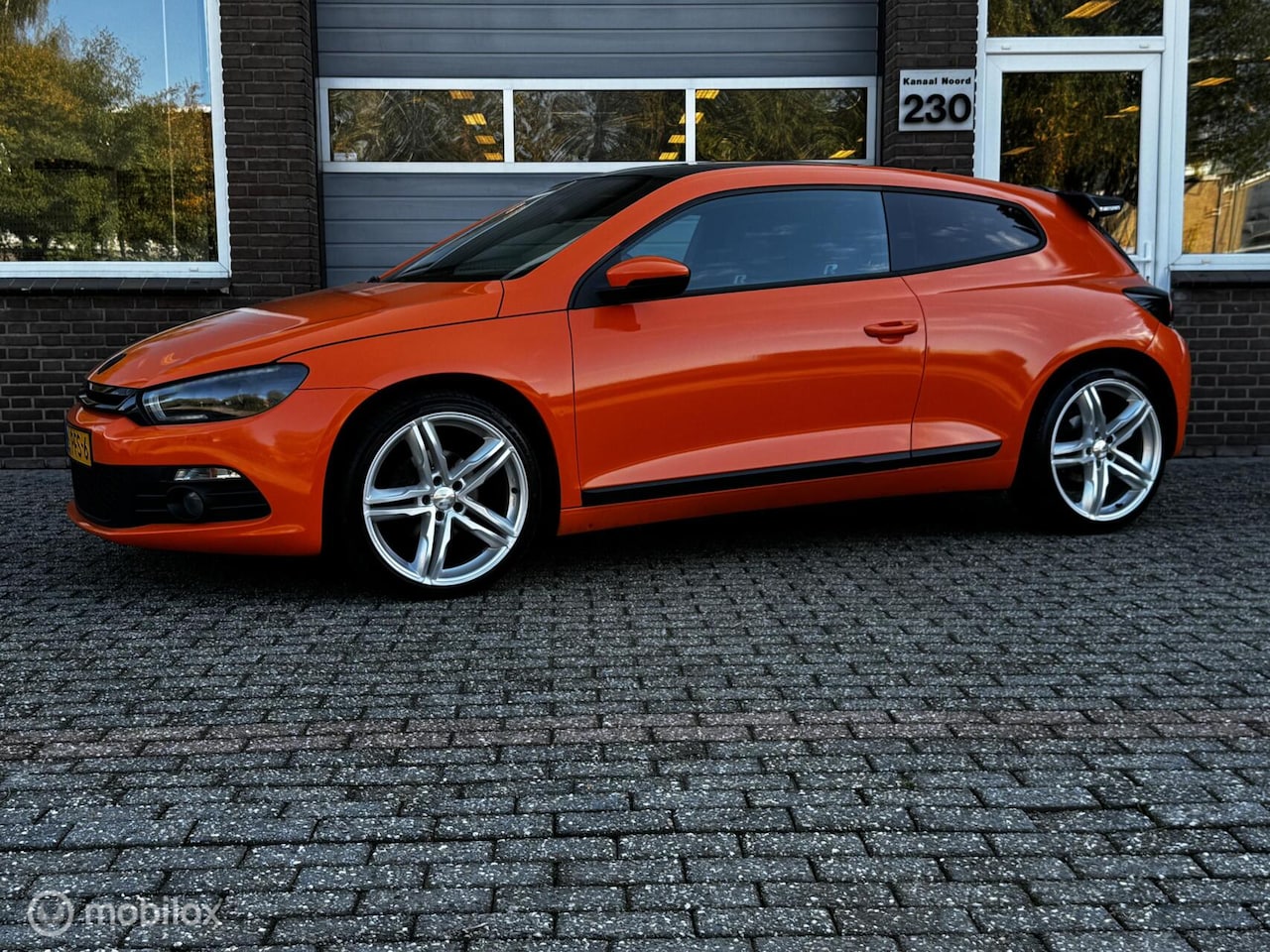 Volkswagen Scirocco - 1.4 TSI ECC-AIRCO/CRUISE/NAVI/PANO - AutoWereld.nl