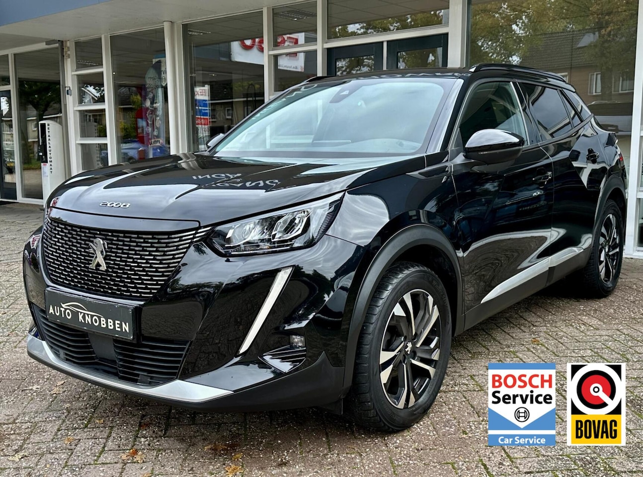 Peugeot 2008 - 1.2 PureTech Allure Camera, Climat, Navi, Carplay, LM.. - AutoWereld.nl