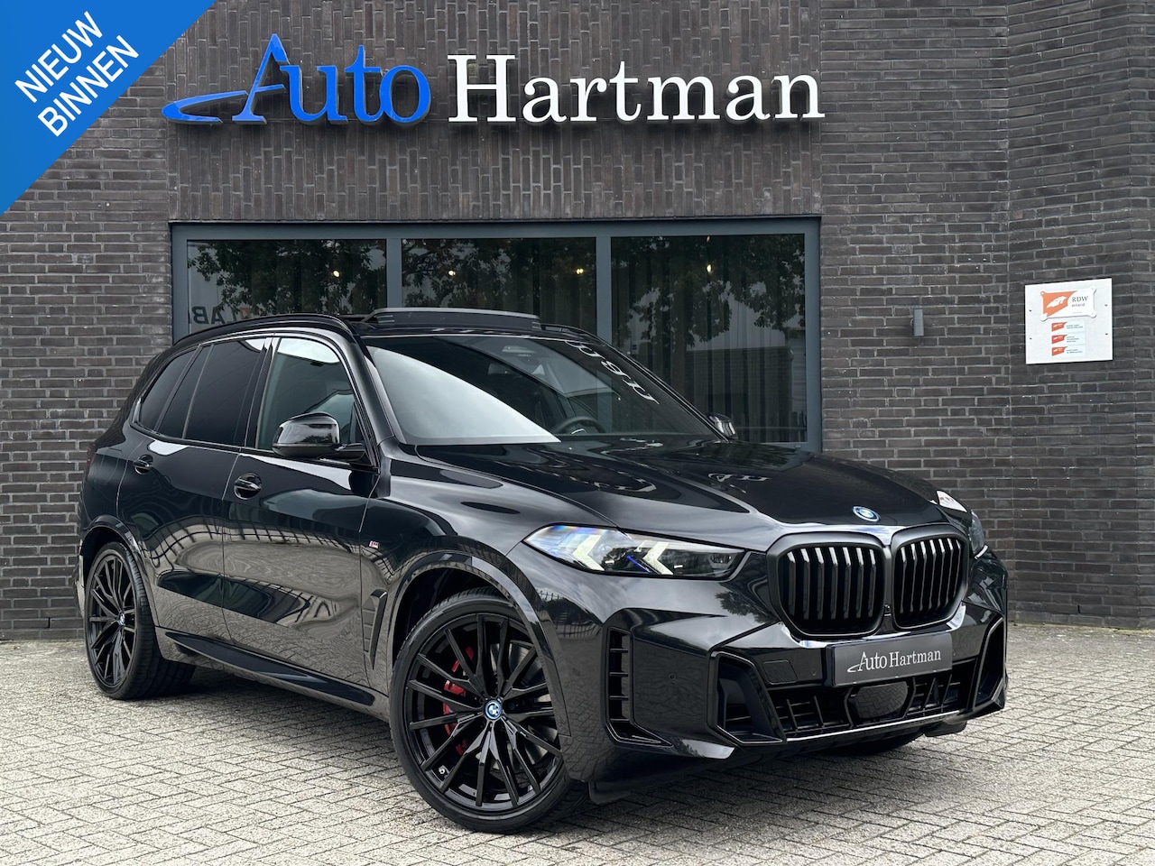 BMW X5 - xDrive50e M Sport Pro PANO|H&K|ICONICGLOW|ACHTERASBESTURING|TRAVELPAKKET - AutoWereld.nl