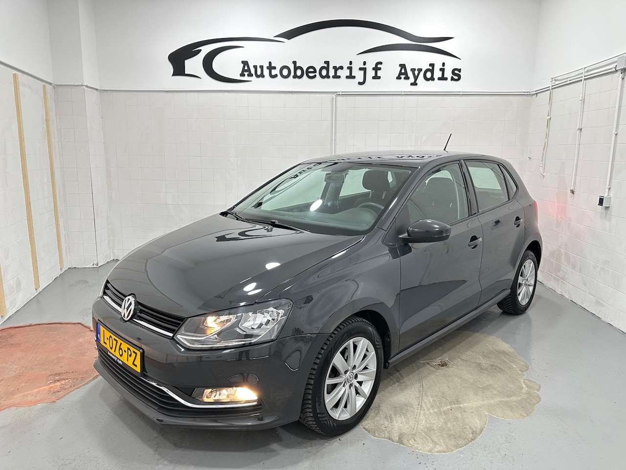Volkswagen Polo - 1.2 TSI Highline Airco EL Ramen 2016 - AutoWereld.nl