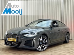 BMW i4 - M50 84 kWh *M-Sport* Schuif/Kantel dak / Carbon / LASER LED / HUD / Harman Kardon / 360 Ca