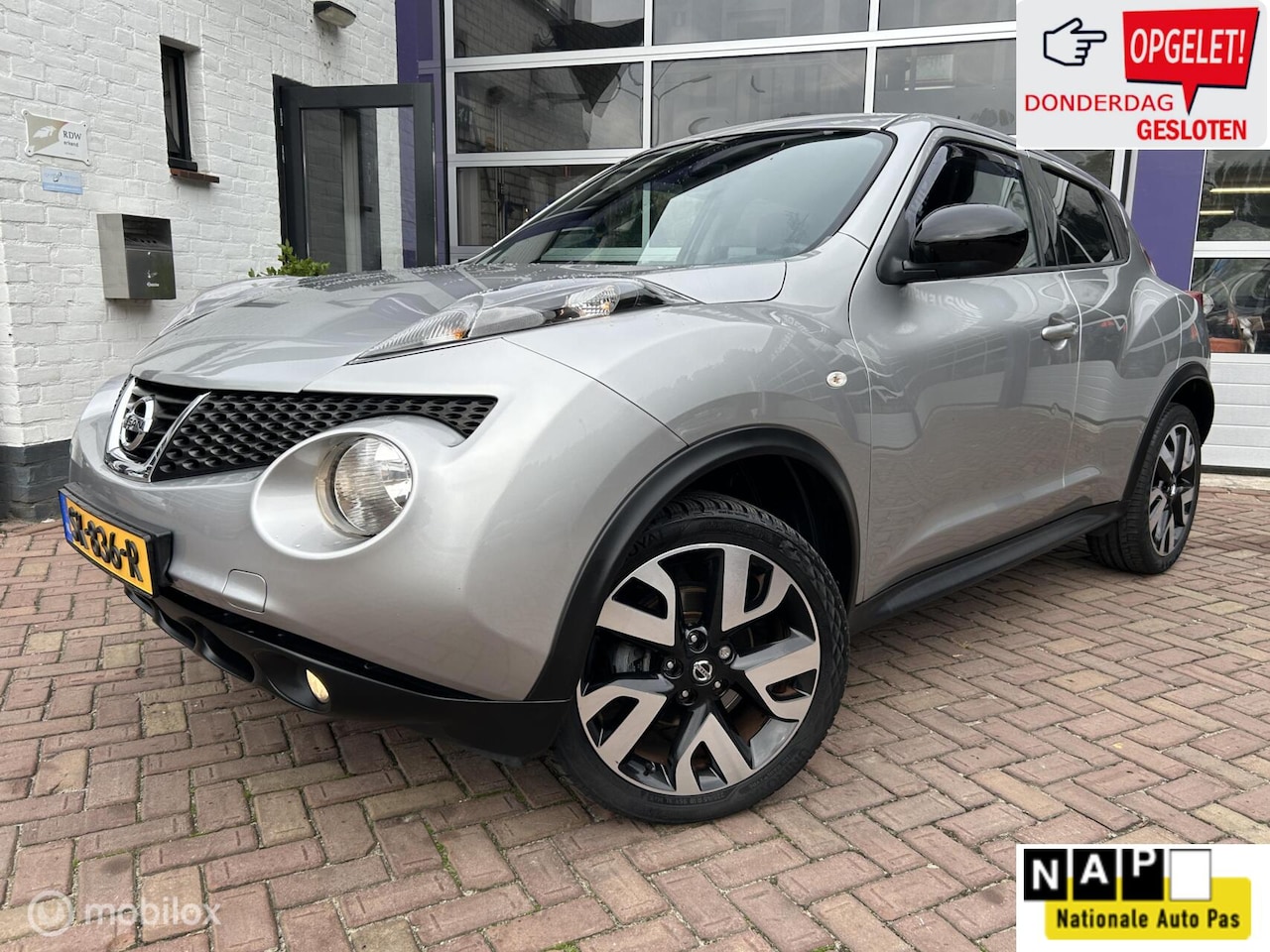 Nissan Juke - 1.6 Connect Edition * NAVIGATIE * AIRCO * LM * - AutoWereld.nl