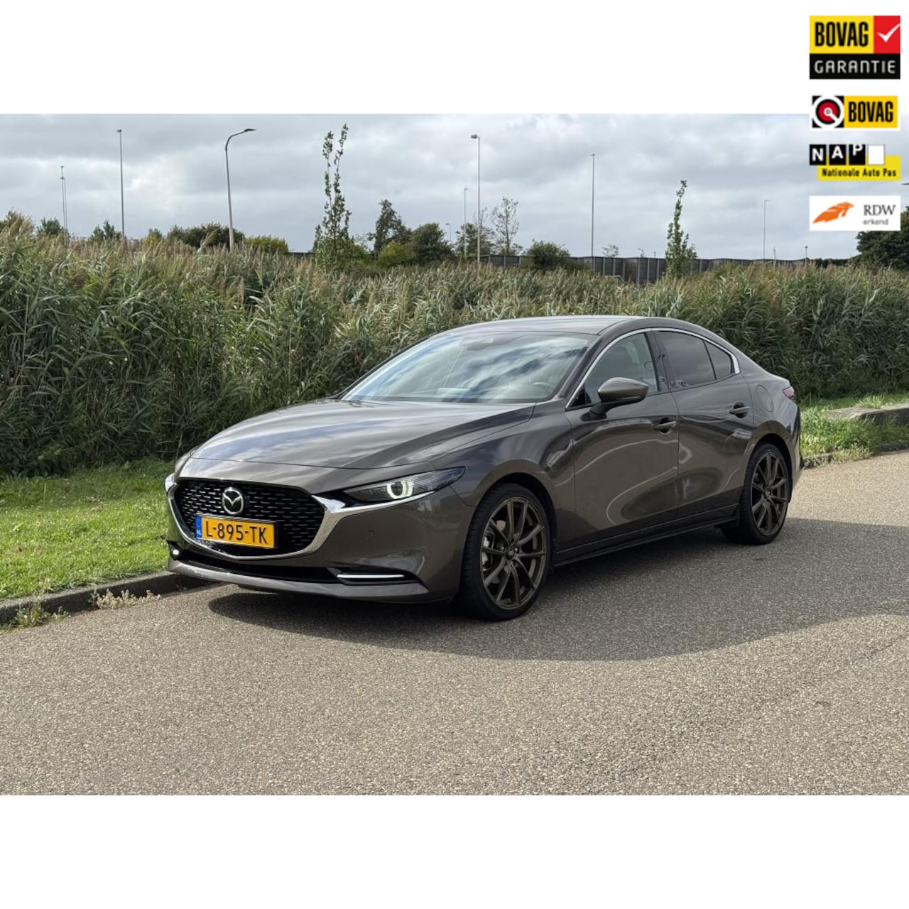 Mazda 3 - 2.0 e-SkyActiv-X M Hybrid 186 Luxury - extra velgenset - AutoWereld.nl