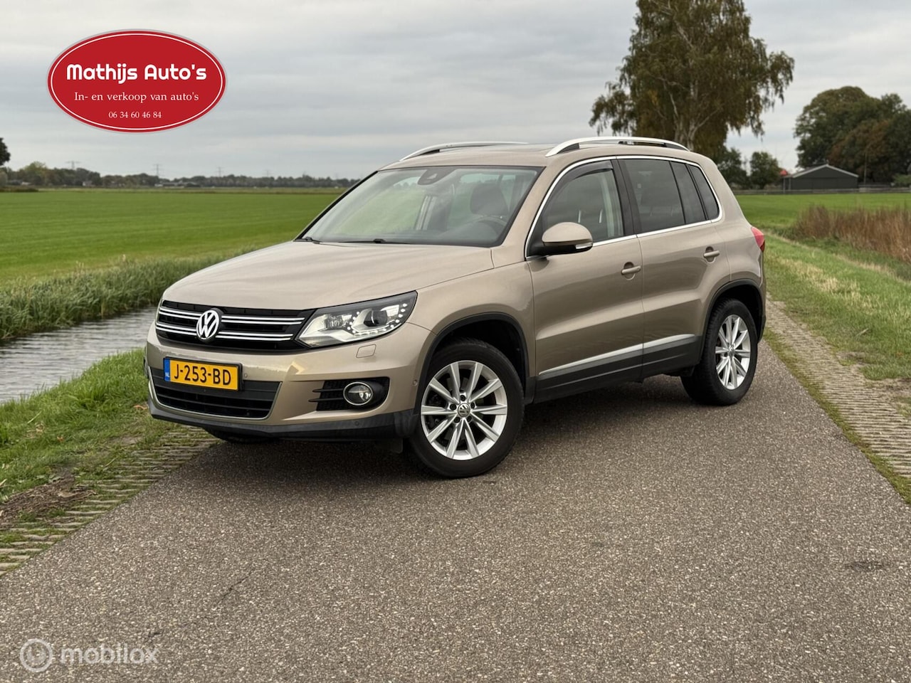 Volkswagen Tiguan - 1.4 TSI Sport&Style Pano Keyless Navi! - AutoWereld.nl