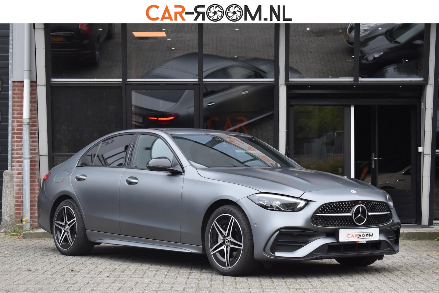 Mercedes-Benz C-klasse - 300 e Luxury Line Amg Line Distronic Stuurvw Mat Grijs - AutoWereld.nl