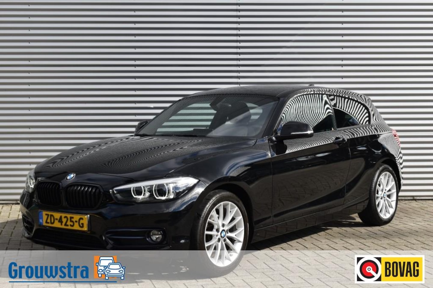BMW 1-serie - 116I SPORT LINE EDITION / NL AUTO / NAVI / PDC / SPORTSTOELEN - AutoWereld.nl