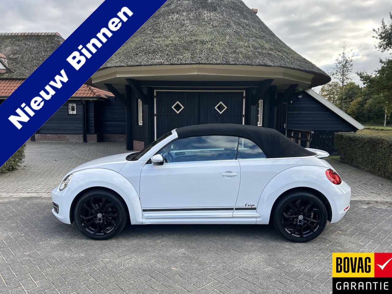 Volkswagen Beetle Cabriolet - 1.2 TSI Design BlueMotion Cup 18 Lm Clima Cruise Pdc Stoelverwarming - AutoWereld.nl