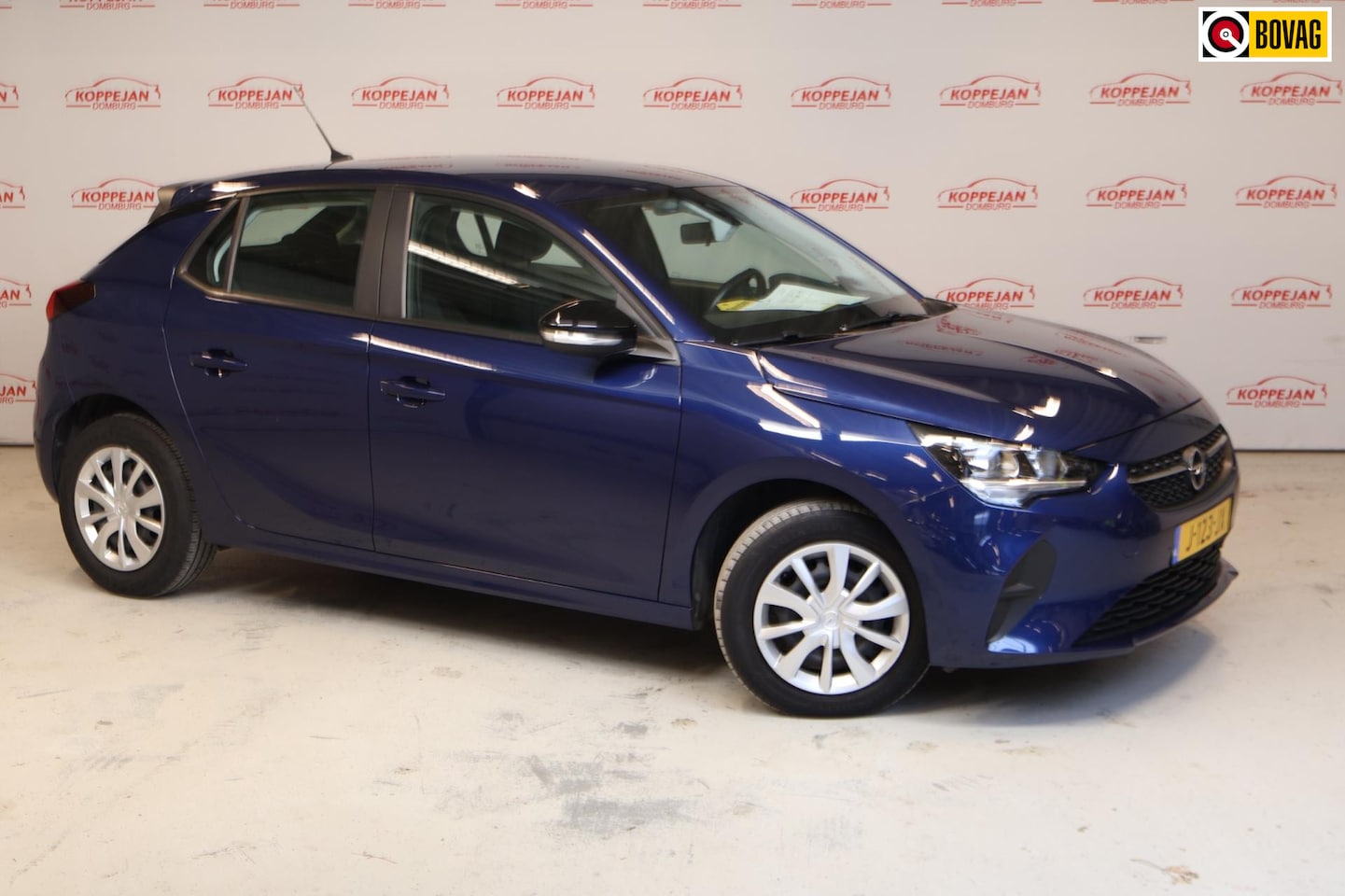 Opel Corsa - 1.2 Edition NL auto, Airco, Cruise controle - AutoWereld.nl