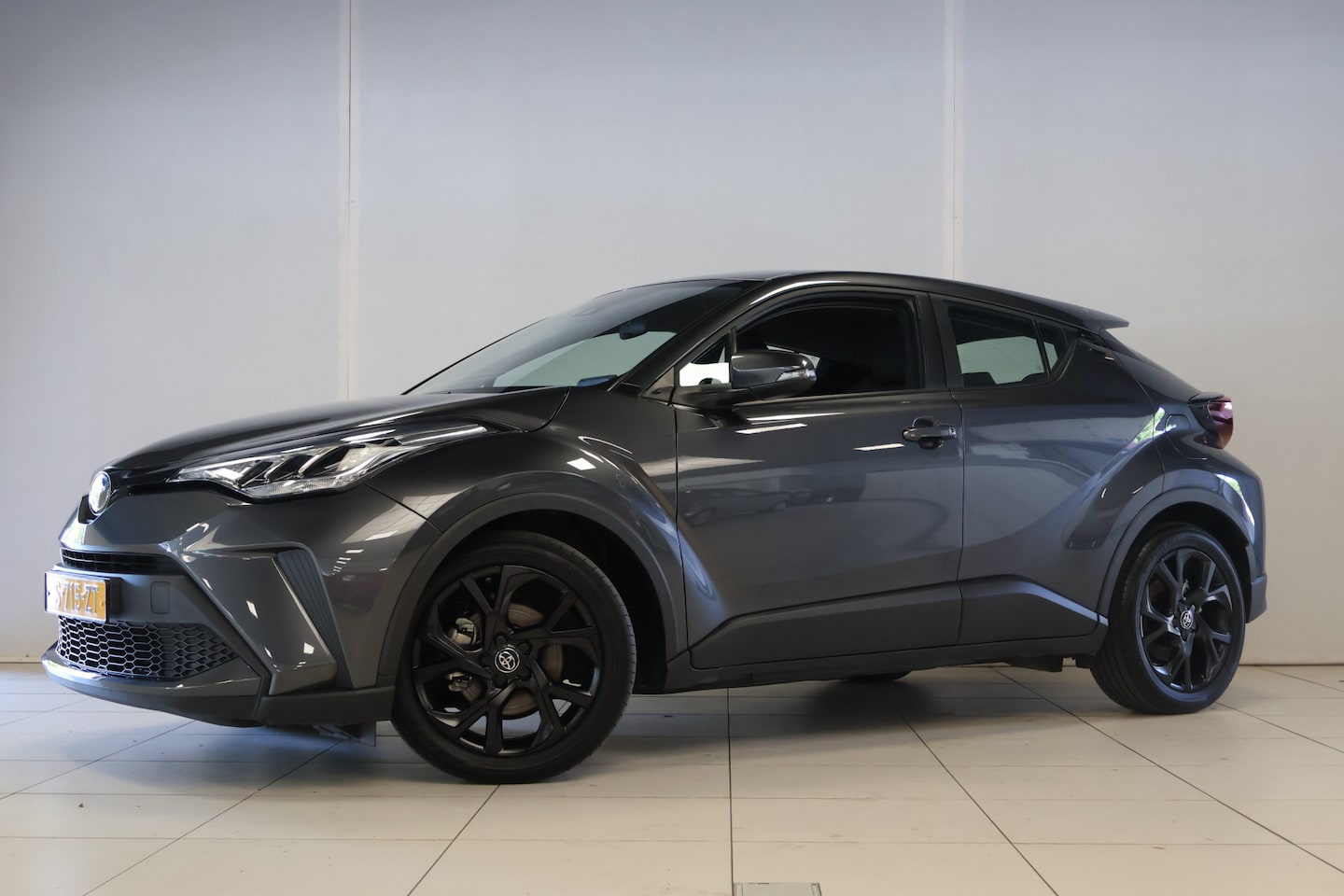 Toyota C-HR - 1.8 Hybrid Business met trekhaak - AutoWereld.nl