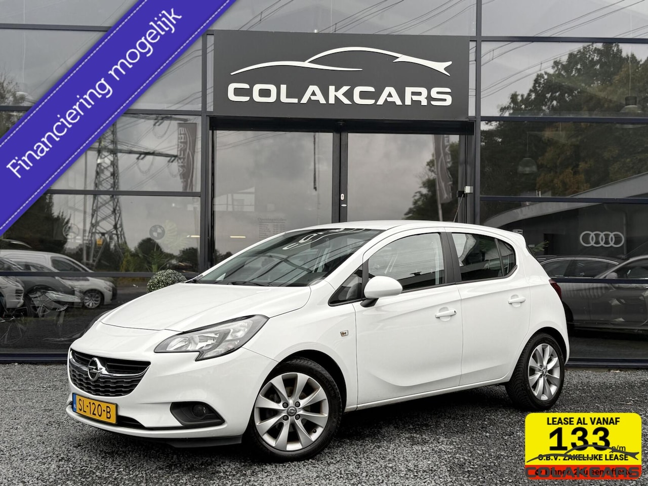 Opel Corsa - 1.4 Favourite Airco-NAP- Carplay-Cruise-Btw auto - AutoWereld.nl
