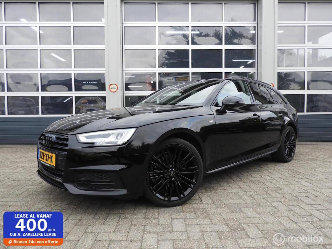 Audi A4 Avant - 1.4 TFSI S-Line , Black Edition - AutoWereld.nl