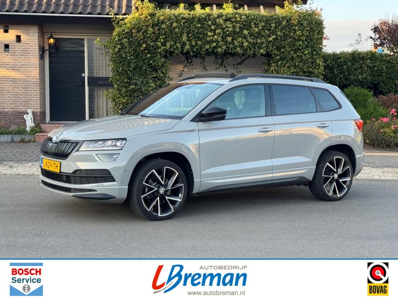 Skoda Karoq - 1.5 TSI ACT DSG SPORTLINE BUSINESS Trekhaak Panoramadak - AutoWereld.nl
