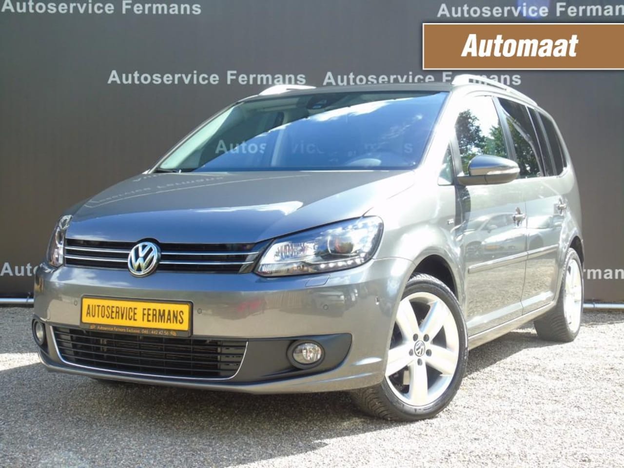 Volkswagen Touran - 1.4TSI 140PK DSG - 2014 - 158DKM - Panodak - Navi - Trekhaak - xenon - AutoWereld.nl