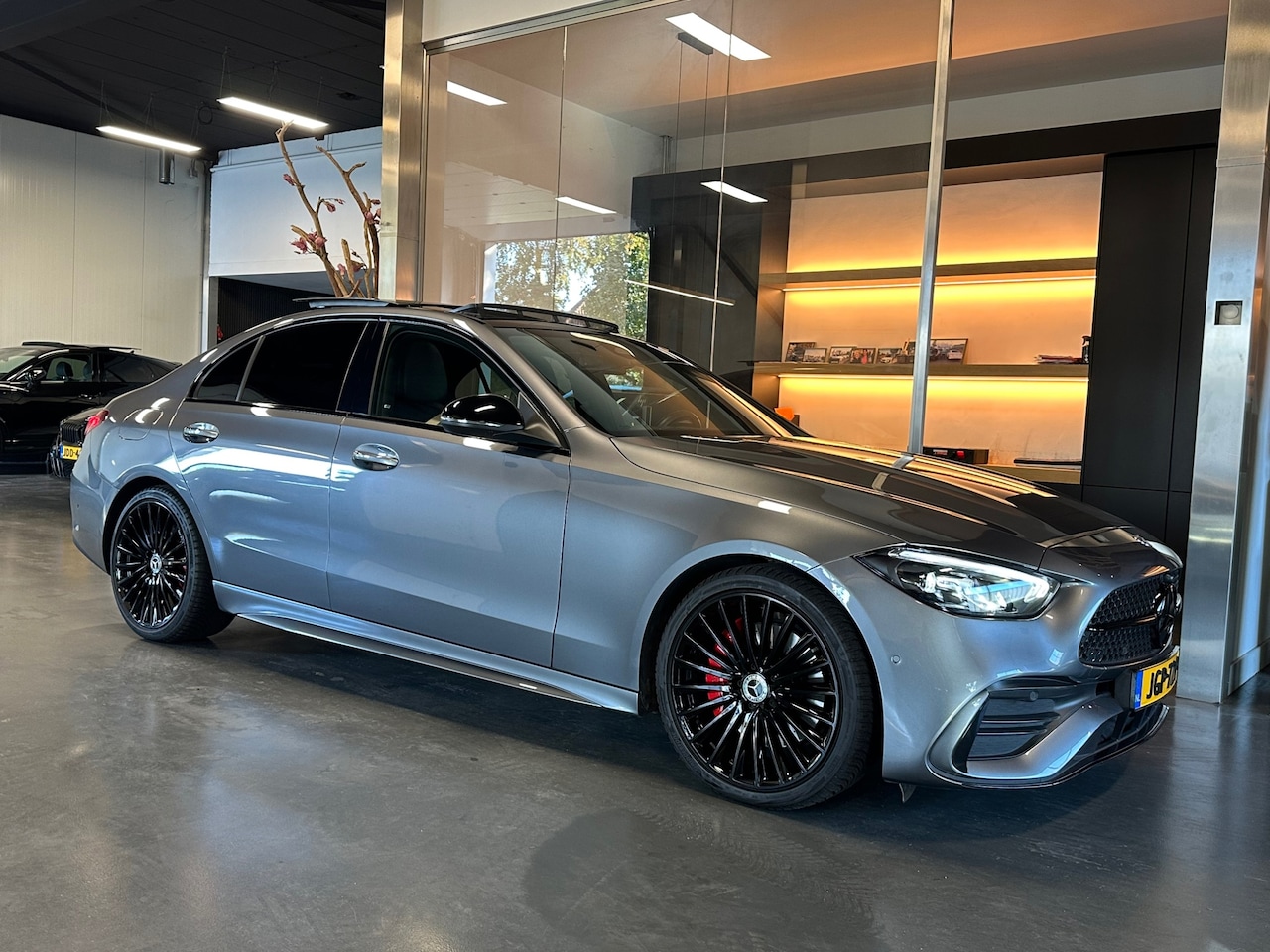 Mercedes-Benz C-klasse - 180 AMG Night Panorama Sfeerverl. 1e eig. - AutoWereld.nl