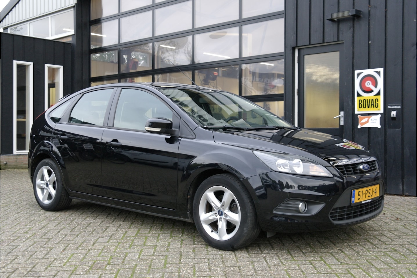 Ford Focus - 1.6 Comfort | Airco | Cruise | NL-Auto | Goed Onderhouden - AutoWereld.nl