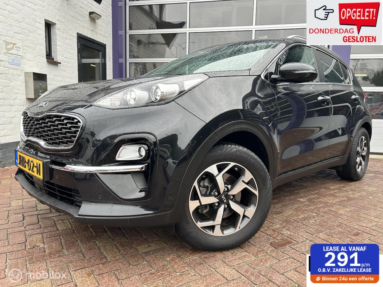 Kia Sportage - 1.6 GDI DynamicLine * NAVI * TREKHAAK * LED * - AutoWereld.nl