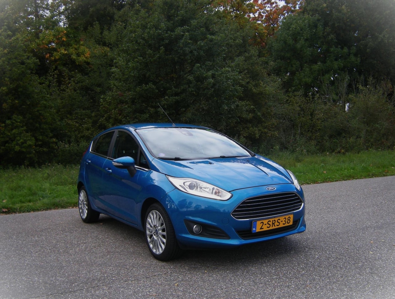 Ford Fiesta - 1.0 EcoBoost Titanium . 101 PK . Airco . Cruiscontrol . PDC . LMV . enz - AutoWereld.nl