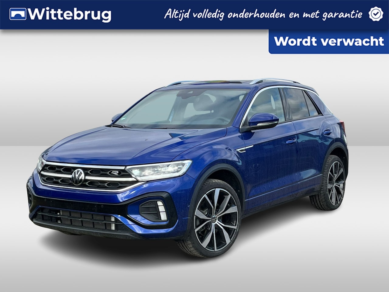 Volkswagen T-Roc - 1.5 TSI 150pk R-Line DSG AUTOMAAT / Panorama dak / IQ LED / Navi / LM 19 inch / Camera / P - AutoWereld.nl