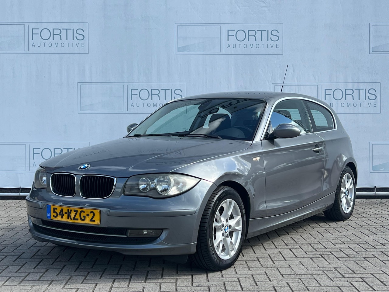 BMW 1-serie - 118i Business Line NL AUTO | AIRCO | LEES TEKST | - AutoWereld.nl