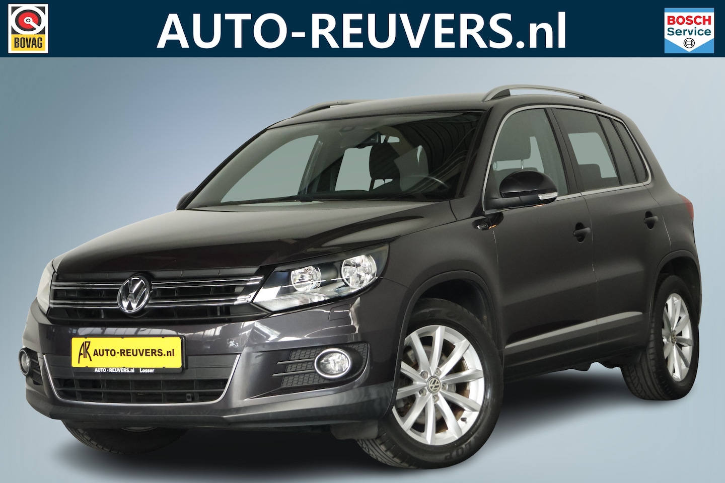 Volkswagen Tiguan - 1.4 TSI Lounge / Navi / Camera / Trekhaak / Cruisecontrol - AutoWereld.nl