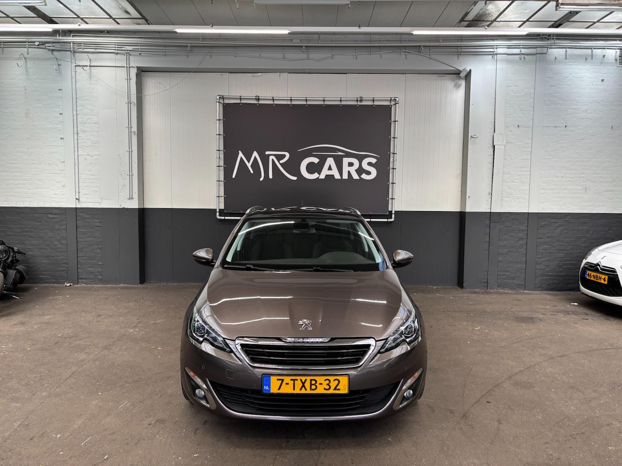 Peugeot 308 SW - 1.2 e-THP Première Pano/Navi/Camera/Cruise Control - AutoWereld.nl