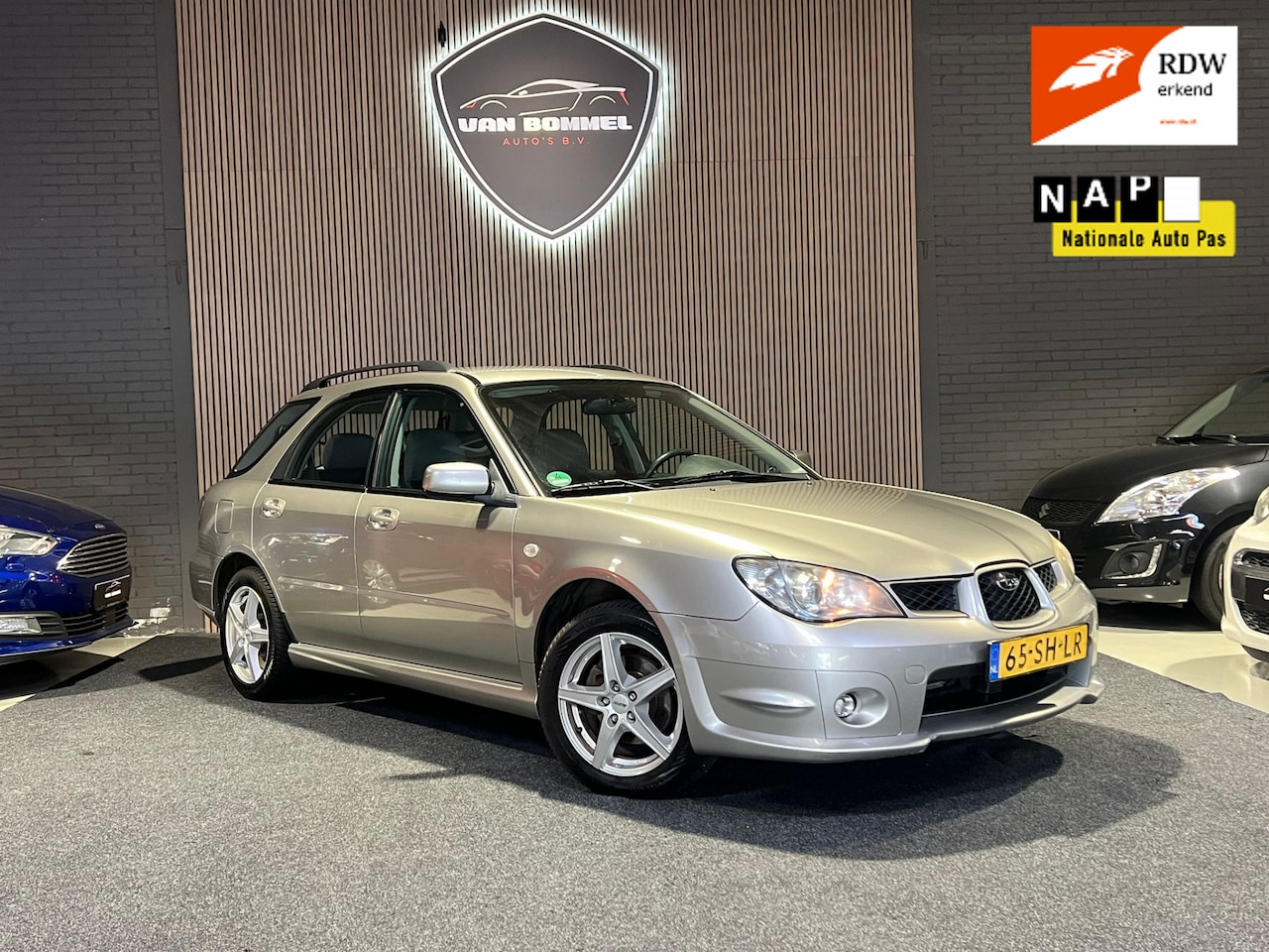 Subaru Impreza Plus - 2.0R Airco.CruiseC.Trekh.Elecpakket.LMV!!! - AutoWereld.nl