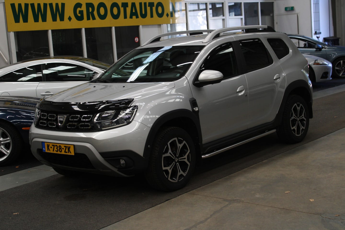 Dacia Duster - 1.2 TCe 4x4 Prestige Airco, Cruise Control, Trekhaak, Stuurbekrachtiging, Rondomzicht Came - AutoWereld.nl