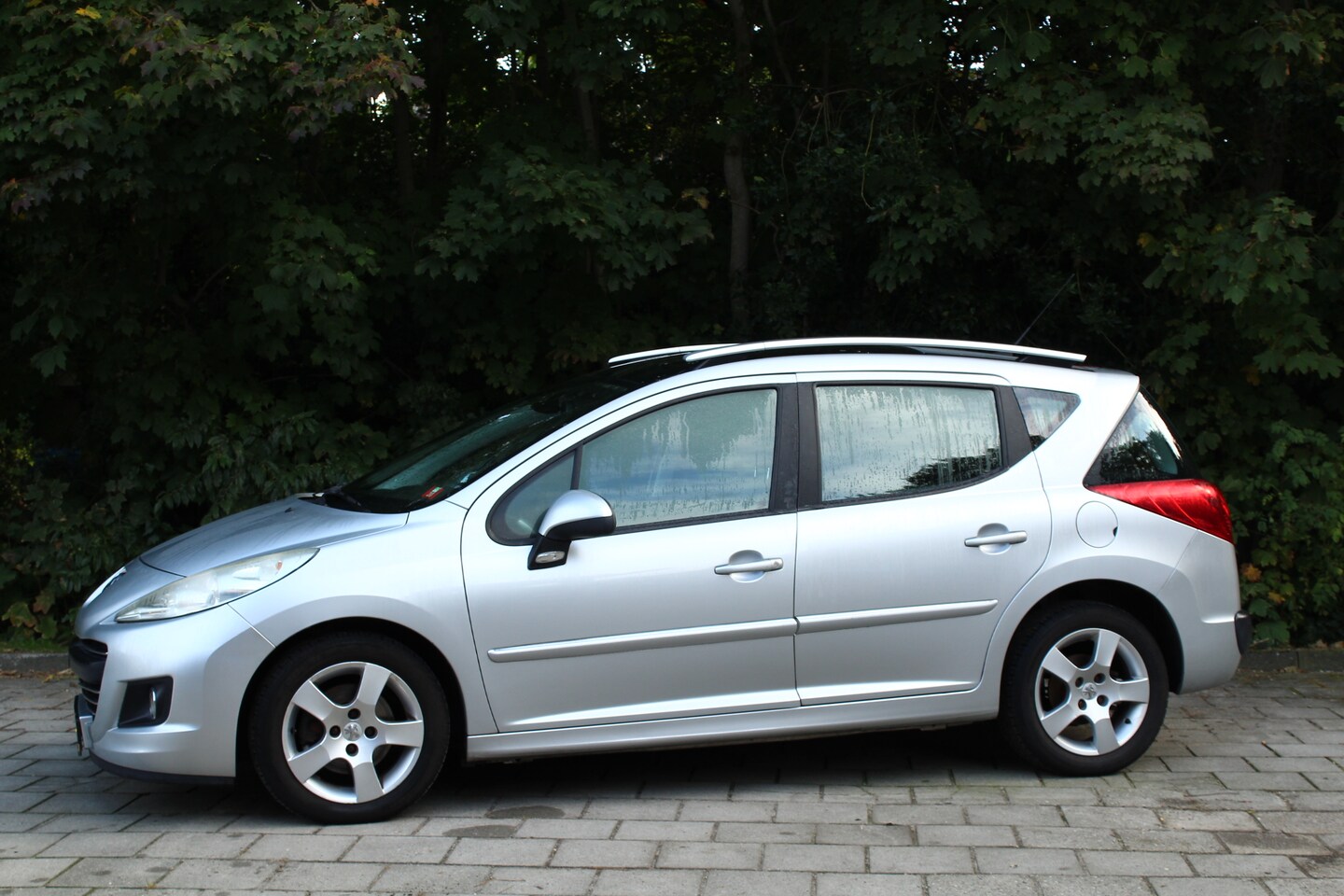 Peugeot 207 SW - 1.6 VTi XS clima/cruise control panoramadak - AutoWereld.nl
