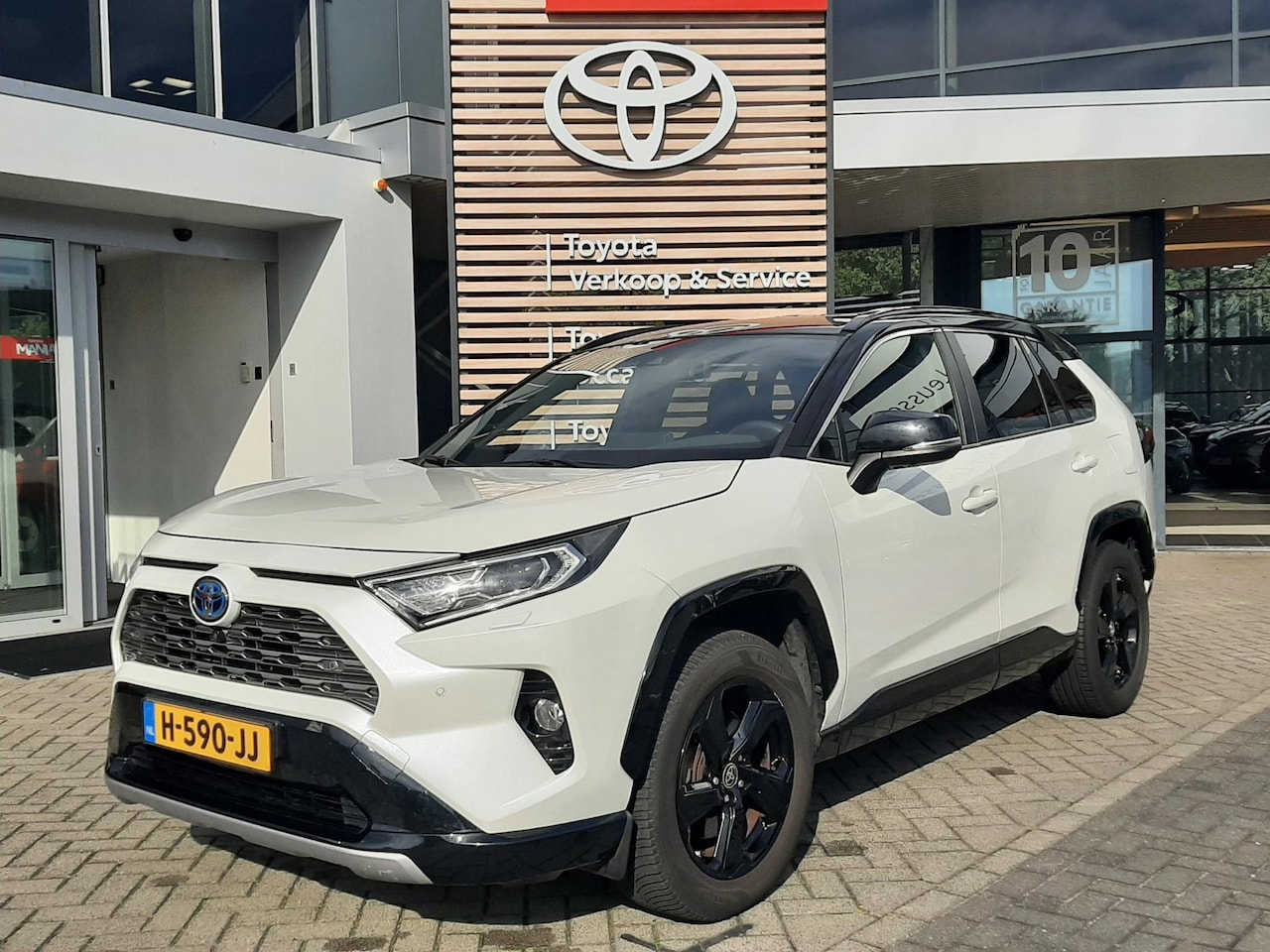 Toyota RAV4 - 2.5 Hybrid Bi-Tone ALL-SEASON PARK-SENSOREN LEDER NAVI STOEL/STUURVERW 360-CAMERA ELEK-STO - AutoWereld.nl