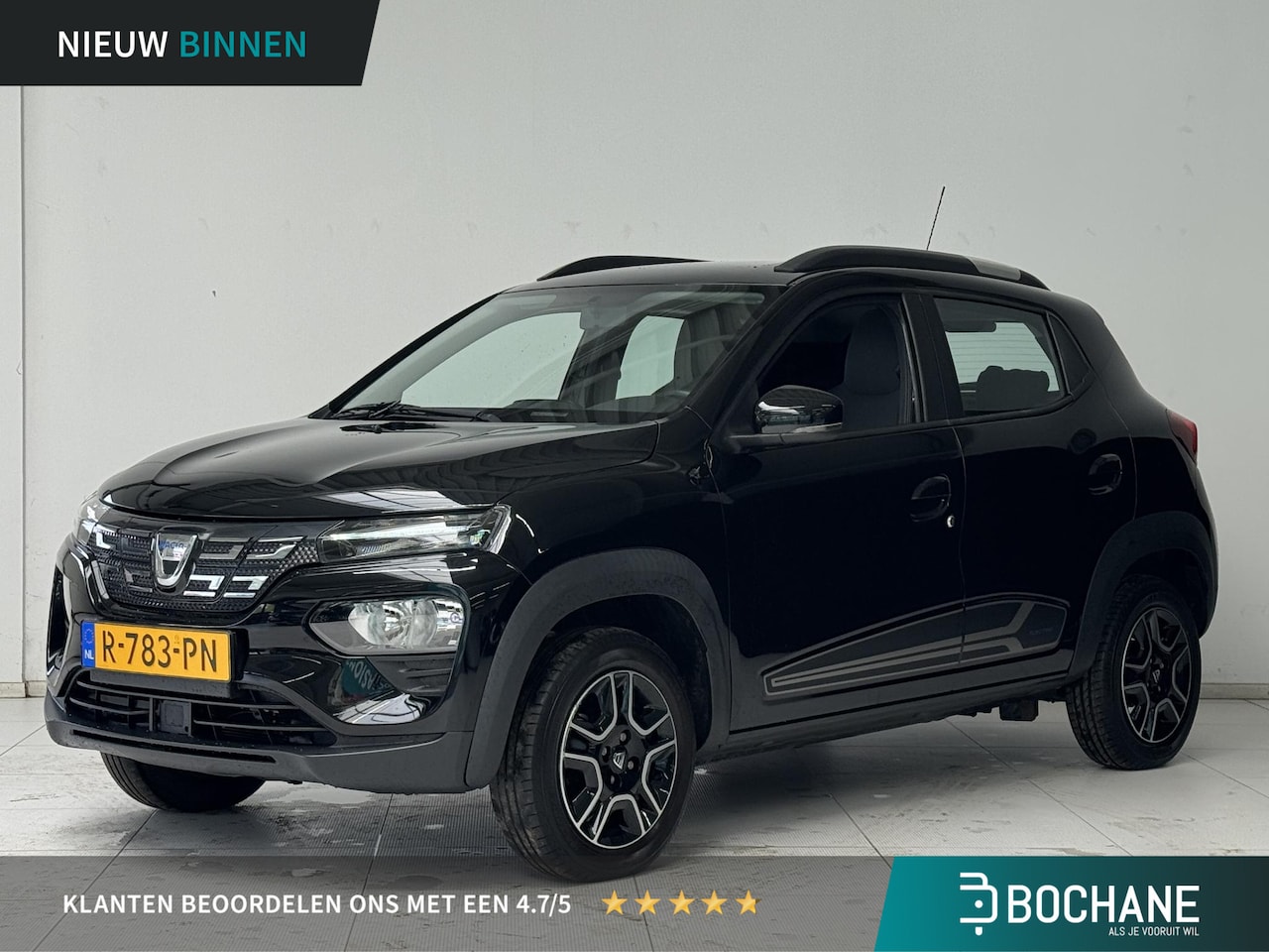 Dacia Spring - Comfort Plus (Orange Pack) 27 kWh | Airco | Navi | Camera - AutoWereld.nl