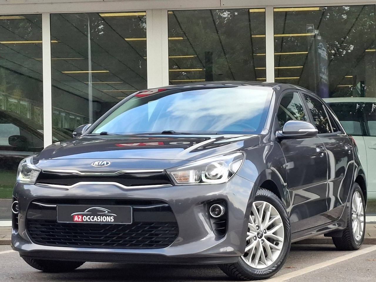 Kia Rio - 1.2 (4 Cilinder) Navi/Camera/Bluetooth/Stoel en stuurverwarming! - AutoWereld.nl