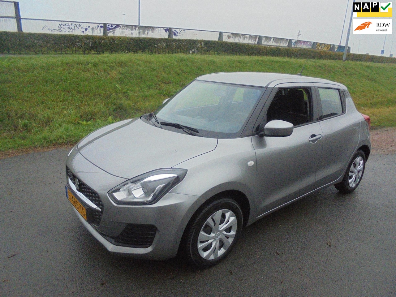 Suzuki Swift - Suzuki swift 1.2 benzine Hybrid airco 30.000 km eerste eigenaar - AutoWereld.nl