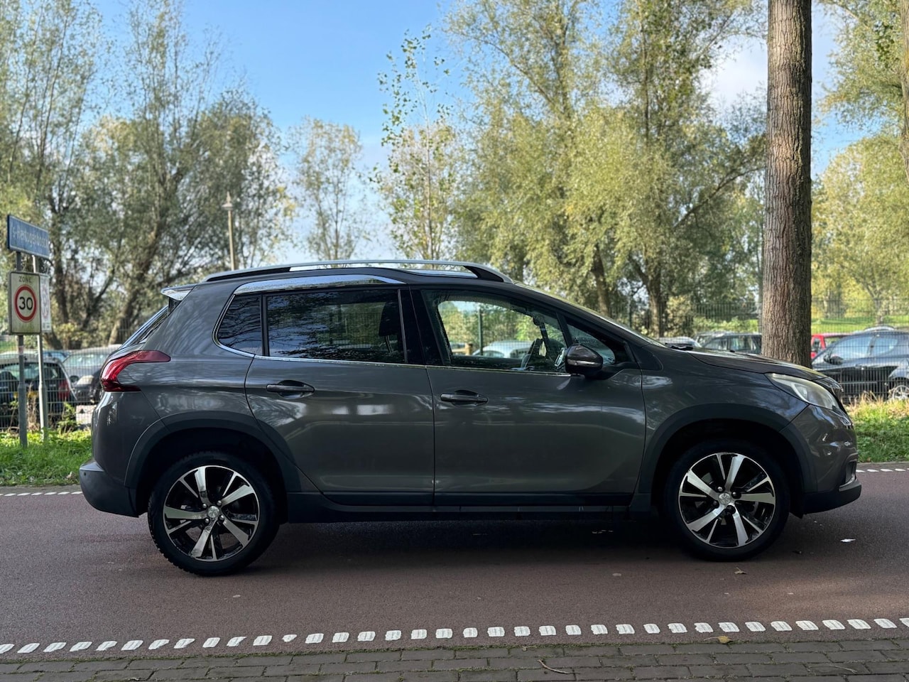 Peugeot 2008 - 1.2 PureTech GT-line CLIMA!NAVI!PANORAMA!LEDER!6BAK! - AutoWereld.nl