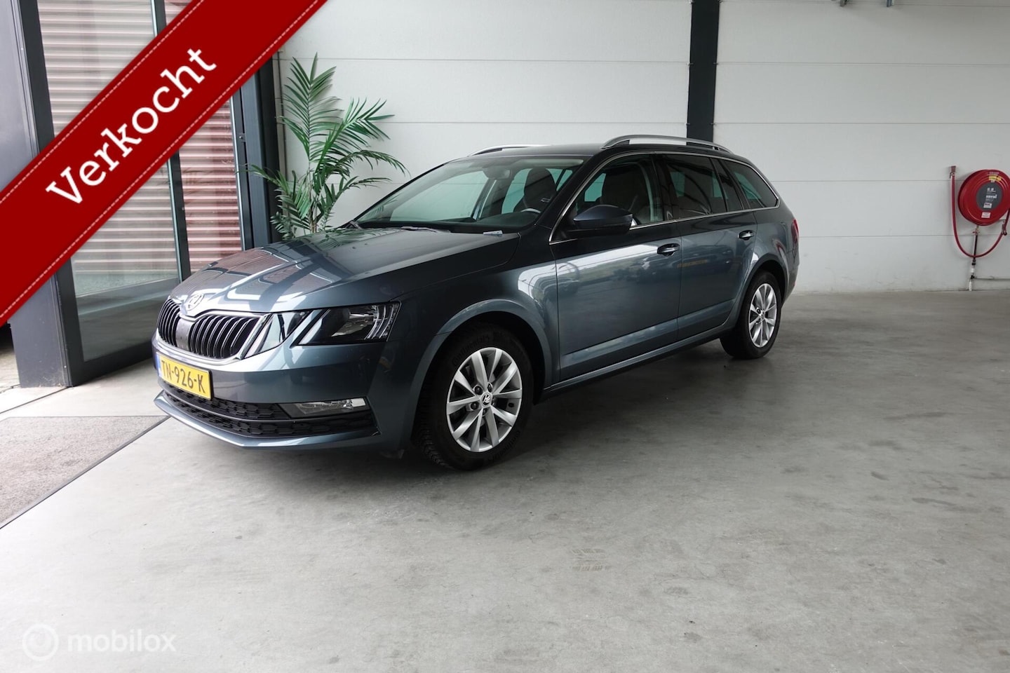 Skoda Octavia Combi - 1.0 TSI DSG Ambition Business - AutoWereld.nl
