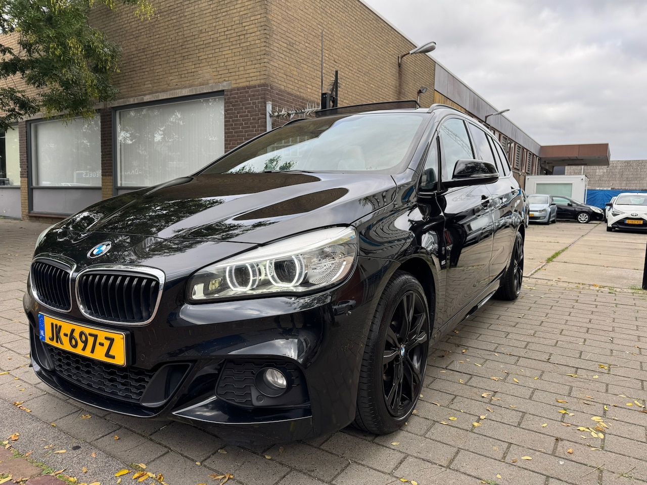 BMW 2-serie Gran Tourer - 220i Centennial High Executive NAP/PANO/M Pakket - AutoWereld.nl
