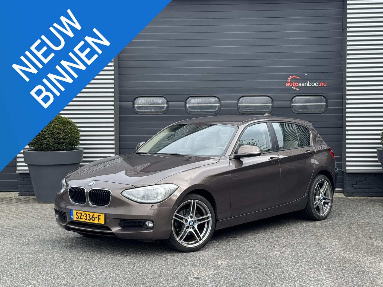 BMW 1-serie - 116d High Executive | Lederen Bekleding | Navigatie | 18 Inch Lichtmetalen Velgen | 5 Deur - AutoWereld.nl