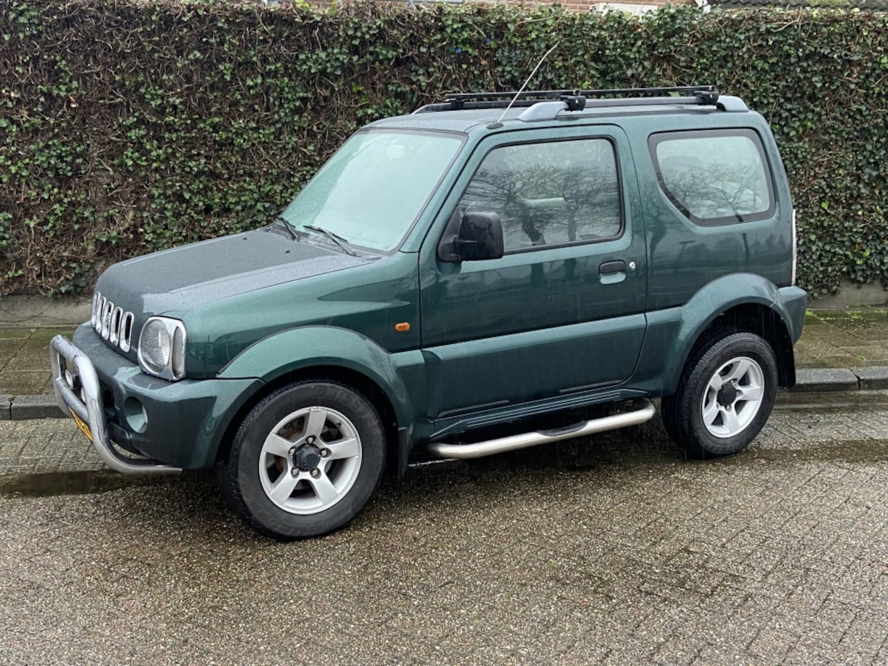 Suzuki Jimny - 1.3 JLX 4WD - AutoWereld.nl