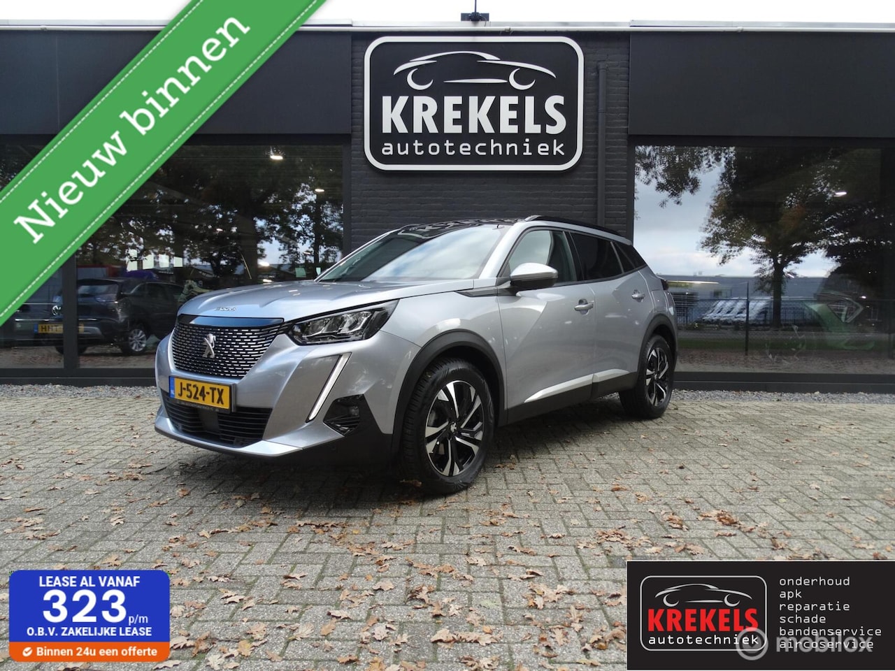Peugeot 2008 - 1.2 PureTech Blue Lease Allure | Panoramadak - AutoWereld.nl