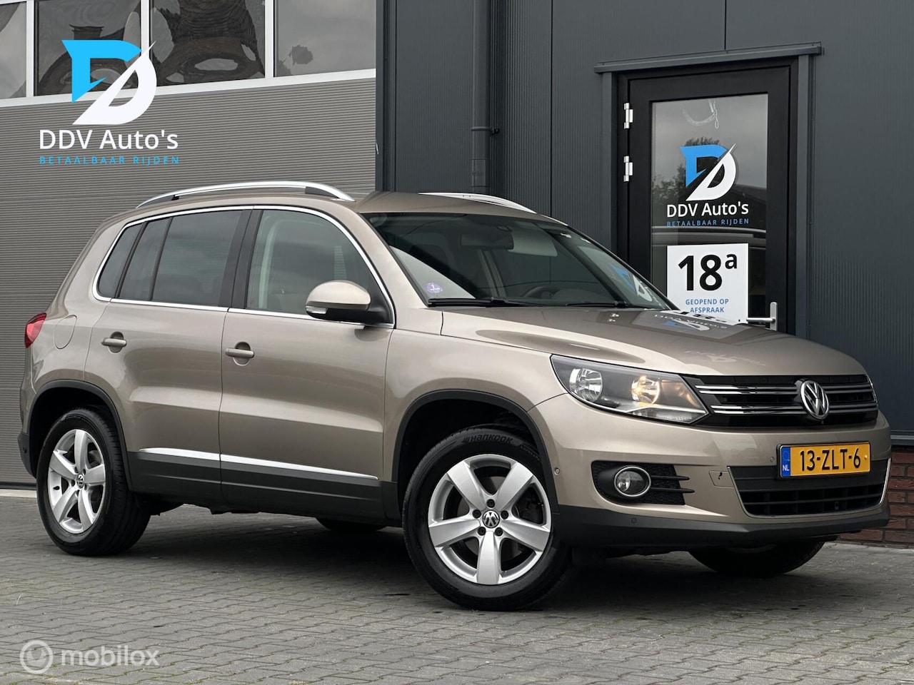 Volkswagen Tiguan - 1.4TSI/123pk Sport&Style|2013|Trekhaak|Navi|NAP|Airco - AutoWereld.nl