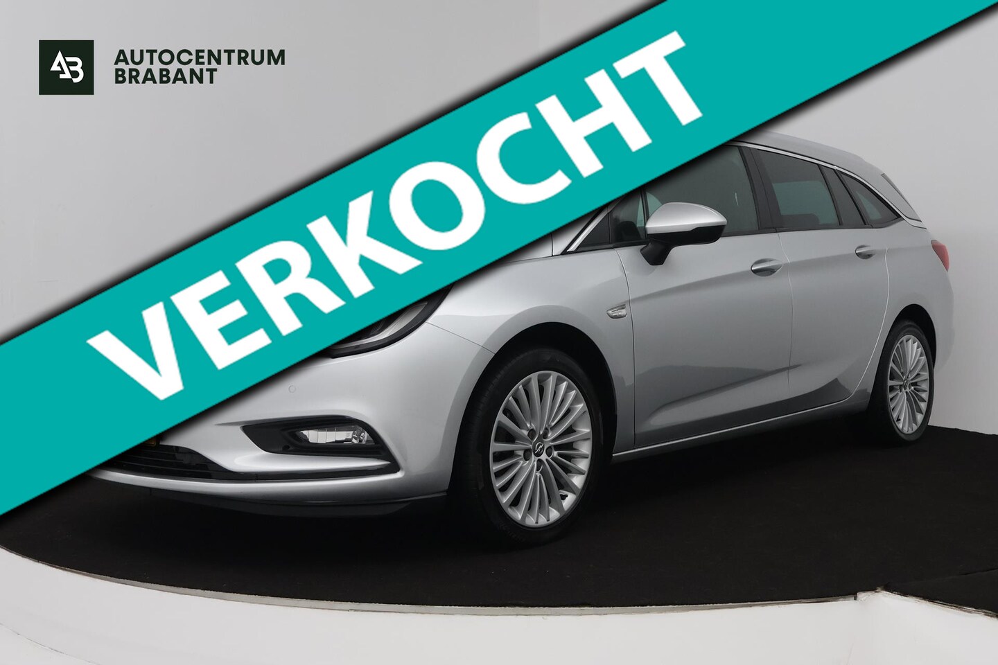 Opel Astra Sports Tourer - 1.4 Turbo Online Edition (TREKHAAK, STOELVERWARMING, PARKEERSENSOREN, NAVIGATIE, CRUISE CO - AutoWereld.nl