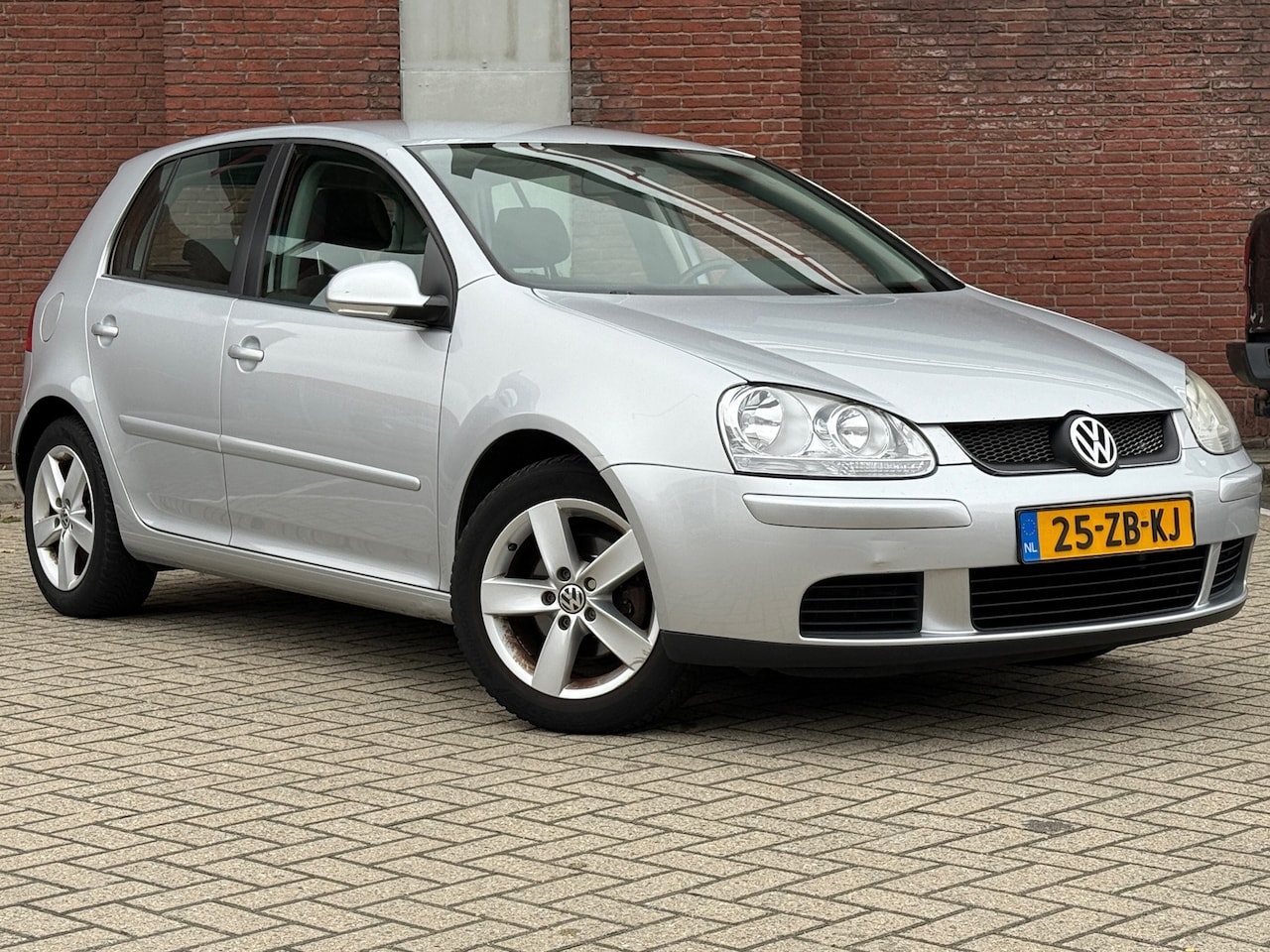 Volkswagen Golf - 1.4 Optive 4|5DRS|AIRCO|NAVI|APK - AutoWereld.nl