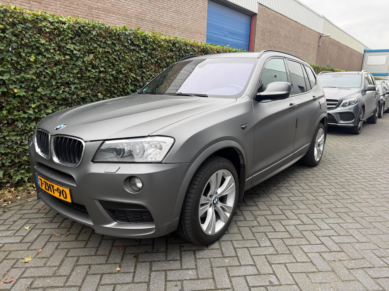 BMW X3 - XDrive20i High Executive mat grijs pano - AutoWereld.nl