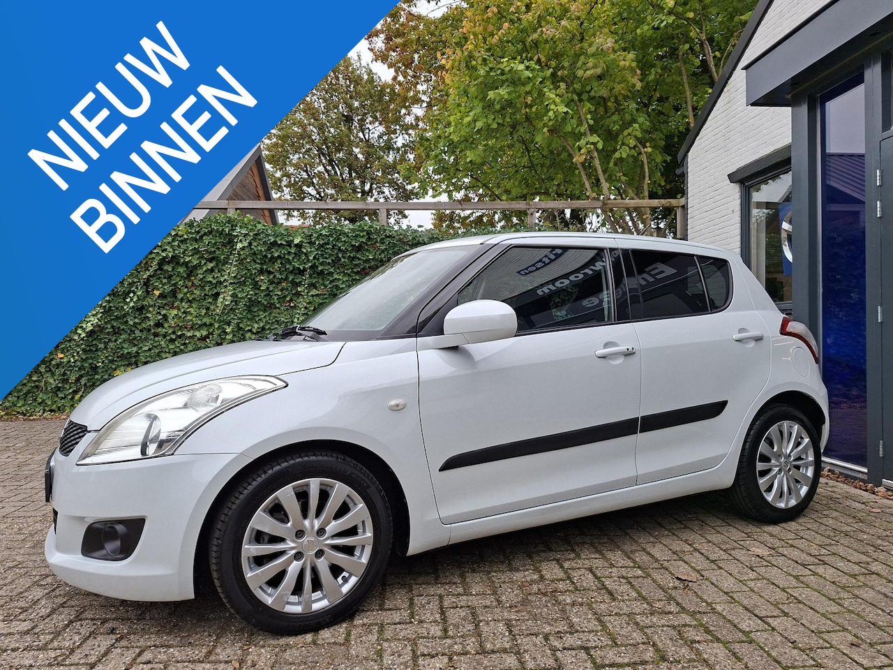 Suzuki Swift - 1.2 Exclusive EASSS Cruise, clima, nieuwe koppeling - AutoWereld.nl