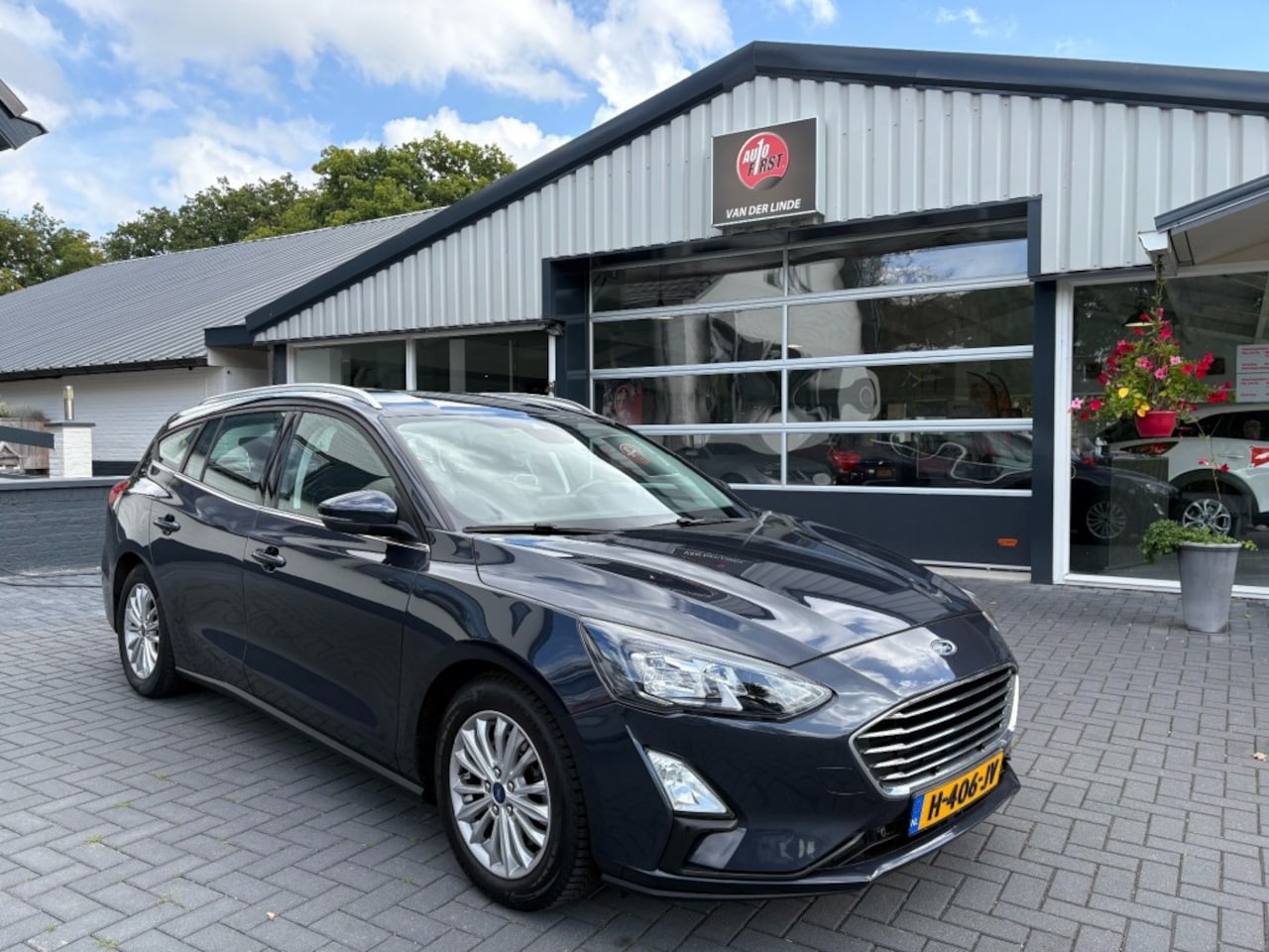 Ford Focus - 1.5 EcoBoost Titanium Business. Cruise control, Airco, All-in prijs incl afleverbeurt - AutoWereld.nl